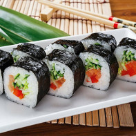 Photo of sushi and rolls